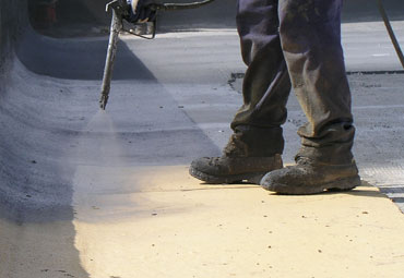 Coating systems over Oakland spray foam roof systems